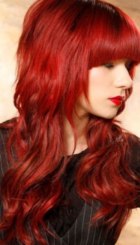 long-wavy-cut-red-hair-bangs-view-2